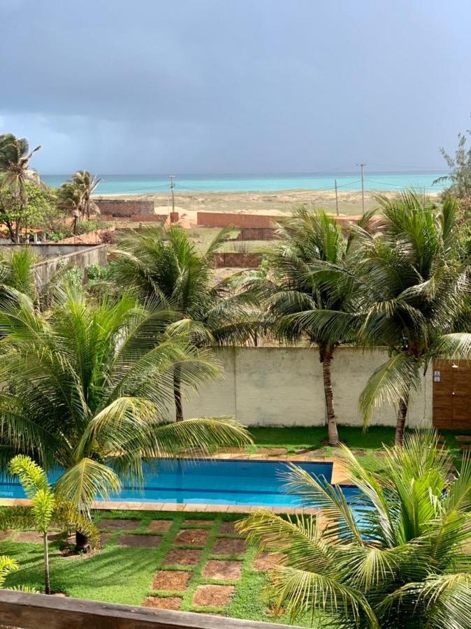 Apartamento com vista para o mar, piscina , deck , playground e estacionamento . Taíba Exterior foto