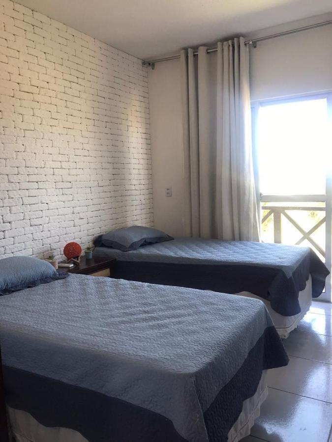 Apartamento com vista para o mar, piscina , deck , playground e estacionamento . Taíba Exterior foto
